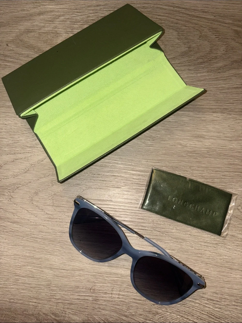 Longchamp Light Blue Frame Sunglasses with Gradient Lenses